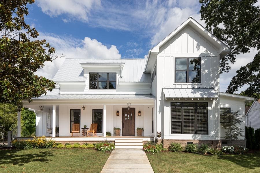 White Farmhouse Exterior Architecture near Nashville, Tennessee. Featured in Farmhouse Magazine